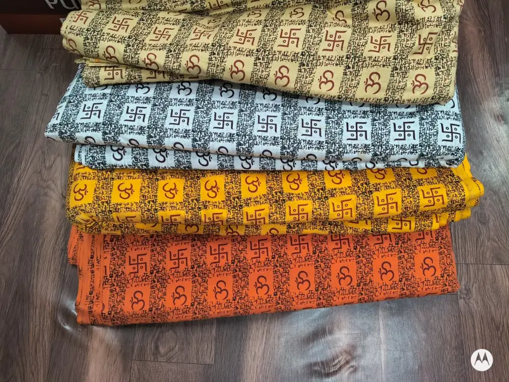 Om Swastik Fabric